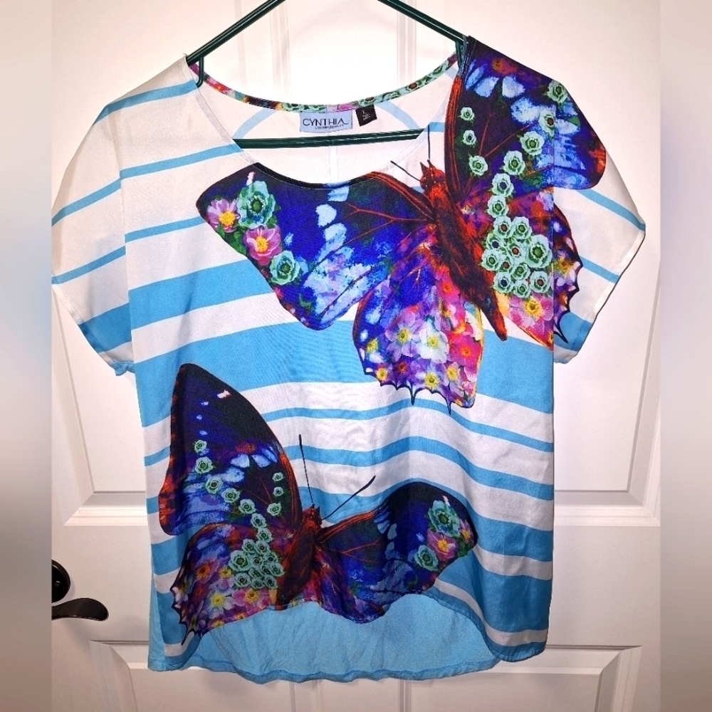 A Cynthia Rowley short sleeve top in a size large with a large butterfly print.